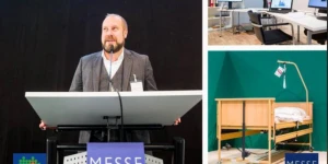 Mann steht vor Podium